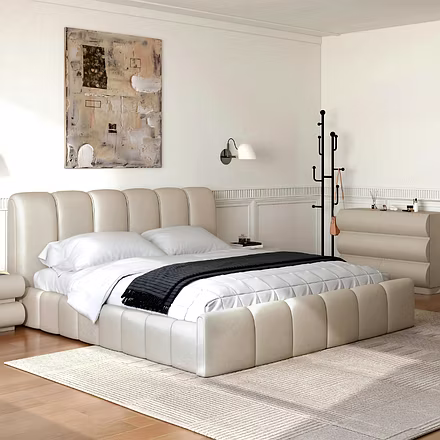 Front-on angle of beige Atlas upholstered bed with white bedding – Customizable platform bed