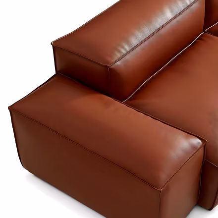 brown: “Arm and back cushion detail of Opulence L shape sofa in brown leather”