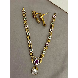 neck lace set and earrings