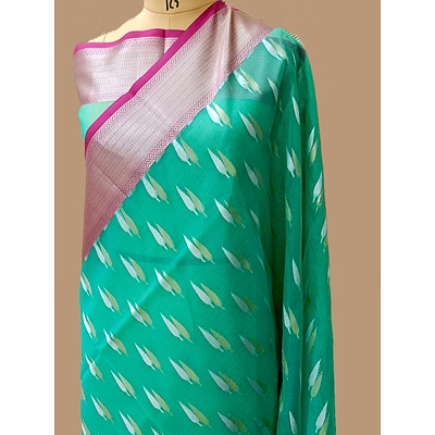 aanchal exquisite sea green kora saree with contrast border and silver gold buti