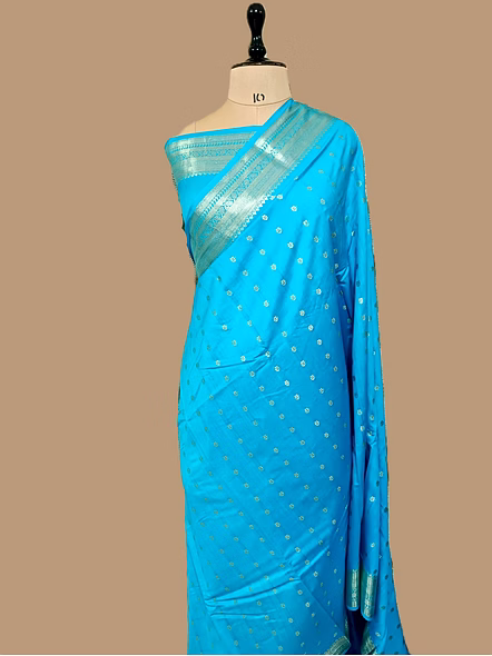 Elegant Firozi Pure Chiniya Silk Banarasi Buti Saree with Silver Zari Detailing