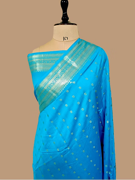 Elegant Firozi Pure Chiniya Silk Banarasi Buti Saree with Silver Zari Detailing