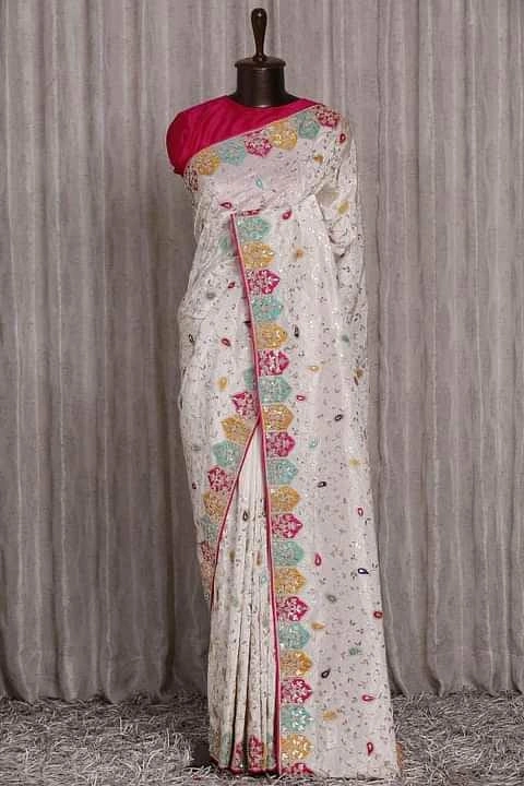 Crafted from georgette fabric, these sarees feature intricate Zardosi saree for women and Girl-White-1