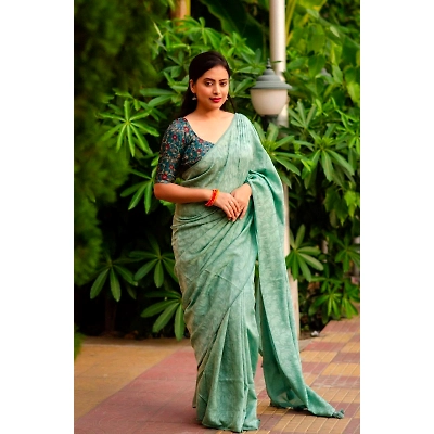 Shree Nakoda Mills Sky Blue Soft silk self-woven Jacquard sarees paired with Kamalkari style printed Jute Silk blouses in festival season for womne and girls