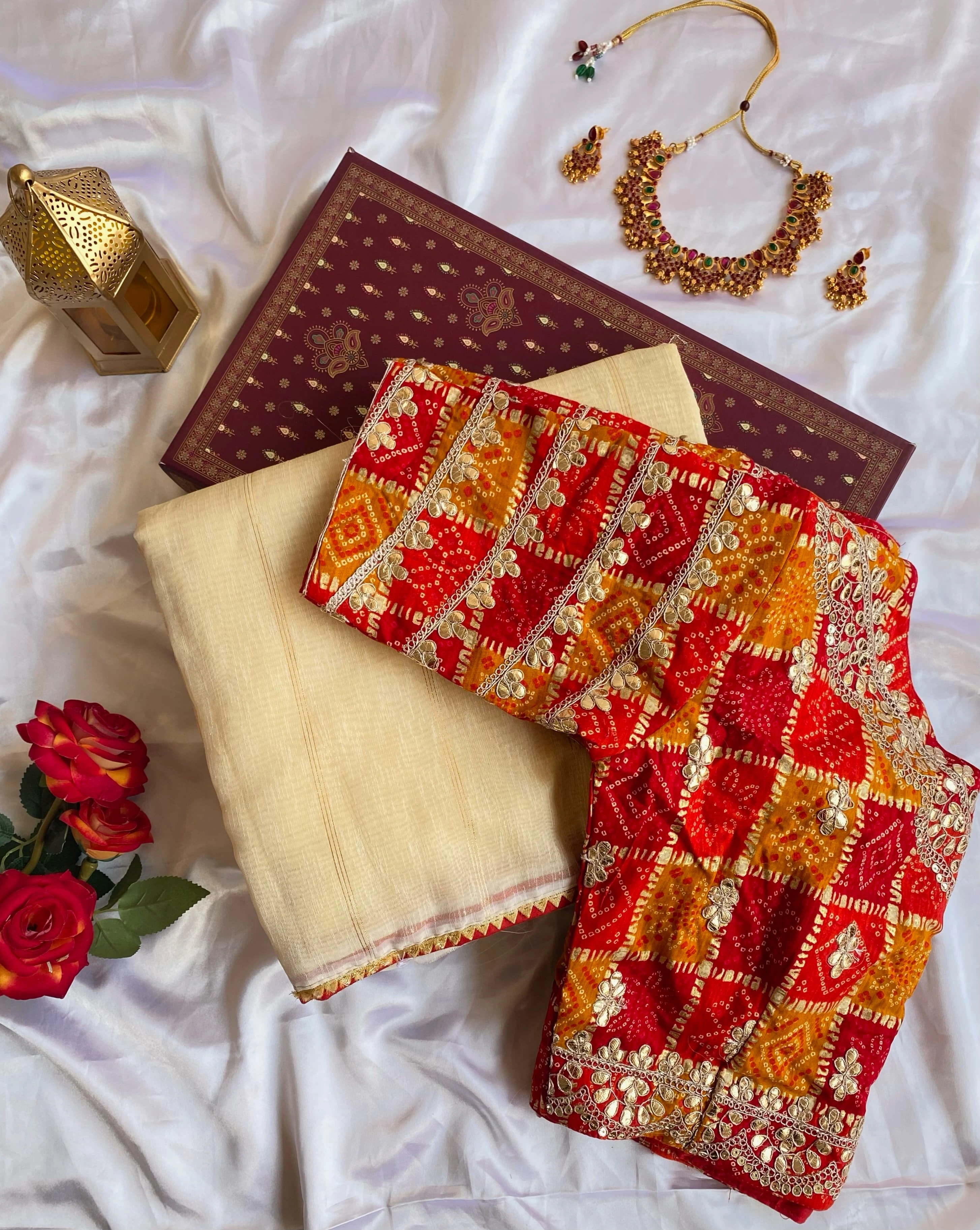 White soft tissue saree with a fancy temple lace border, zari stripes, and paired with a stitched padded Bandhani blouse-White-4