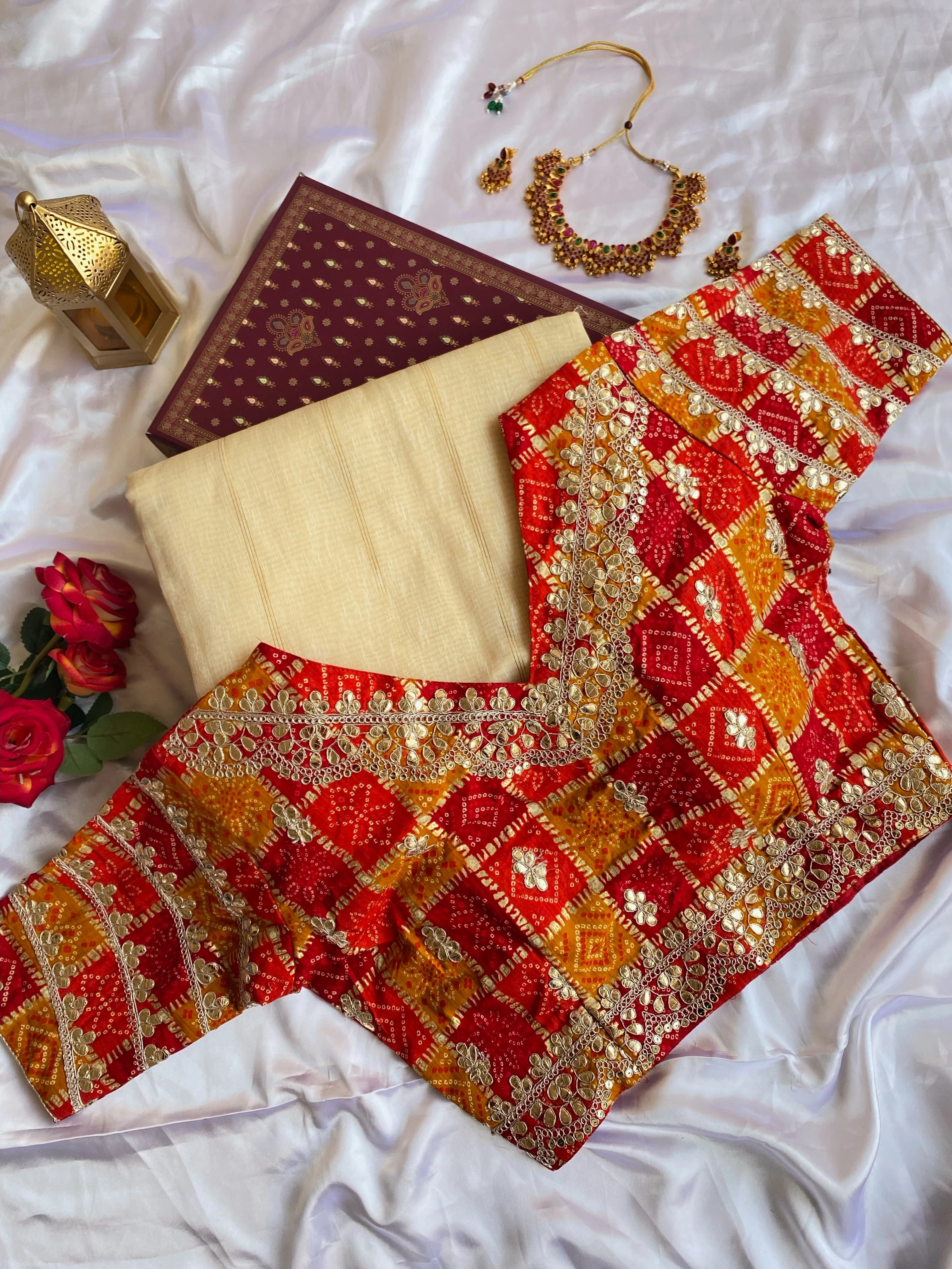 White soft tissue saree with a fancy temple lace border, zari stripes, and paired with a stitched padded Bandhani blouse-White-5