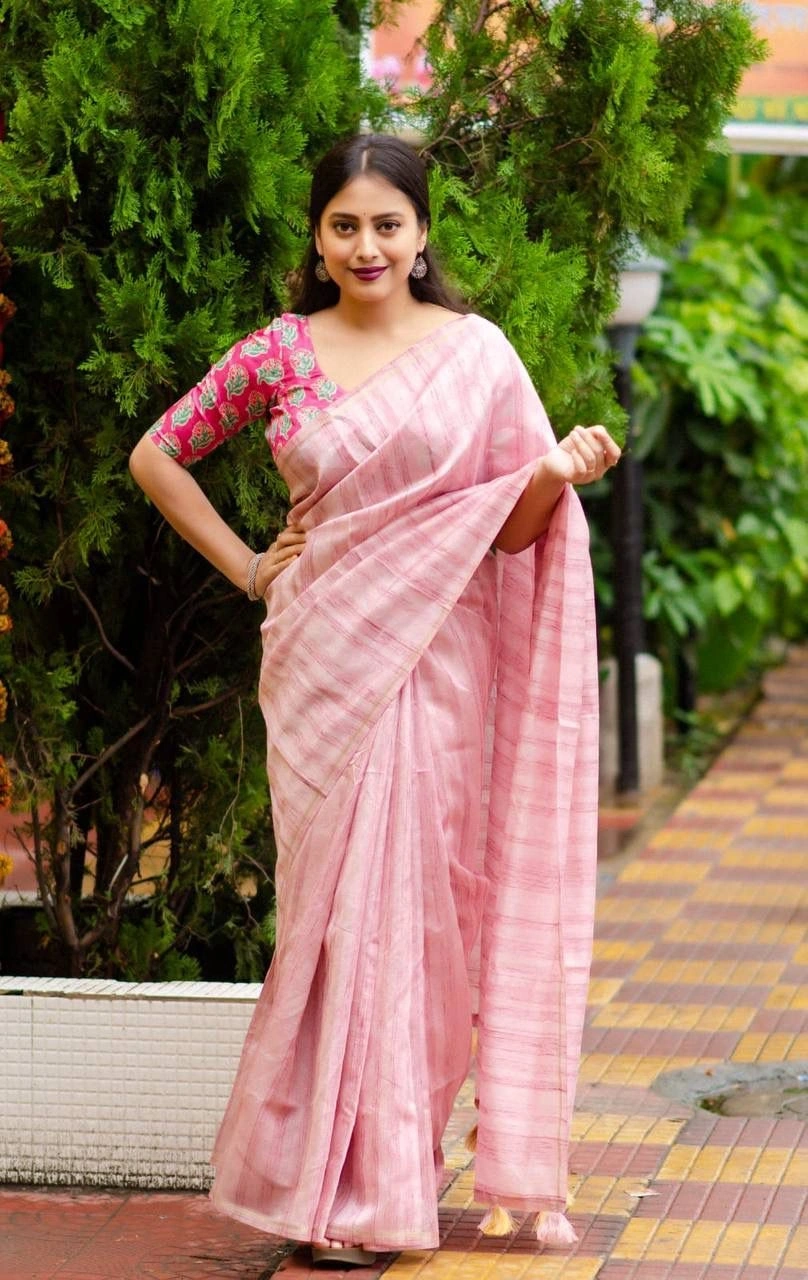 Pink silk Indian saree features an allover woven slub pattern in online best buget and quality-Pink