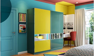 A Stylish Wardrobe With Sliding Doors And A TV Unit