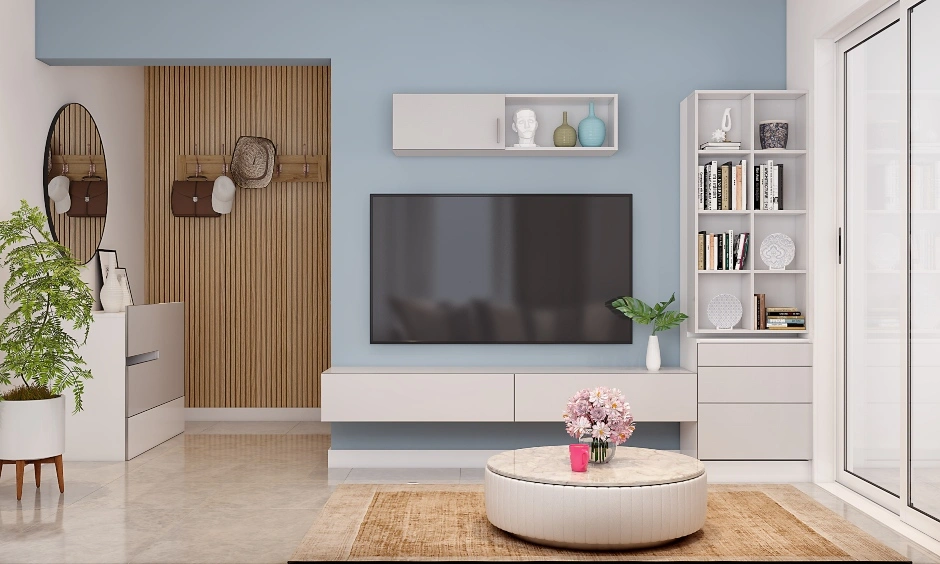 An All White Modern Living Room With A TV Unit Cum Bookshelf-3