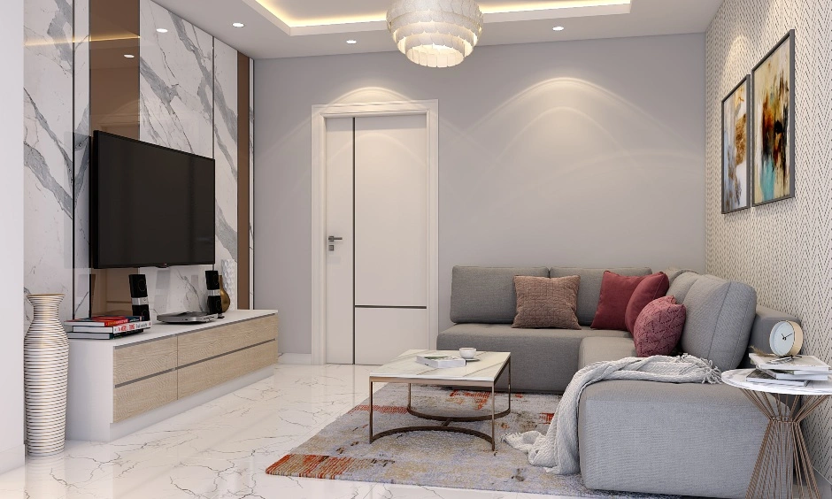 An Neutral Toned Living Room With A Marble Panelled Wall And A Partition-1