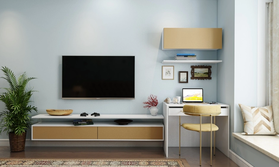 A Bedroom With A Wall Mounted TV Unit And A Study Table-1