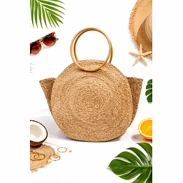 sustainable round woven straw beach bag with circular wooden handles - summer vacation tote with tropical flat lay styling for wholesale export supply