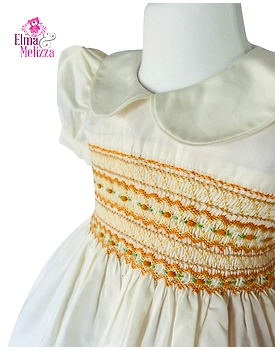 Creamy White Hand Smocked Hand Embroidered Baby Girl Dress with Orange Florals for Birthdays, Weddings & Elegant Family Photoshoots