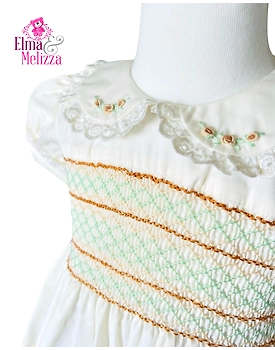 Creamy White Hand Smocked Embroidered Baby Girl Dress with Peter Pan Collar & Lace - Timeless Celebrations