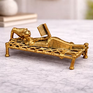 Brass Woman Figurine Studying on Cot – Handcrafted Metal Art