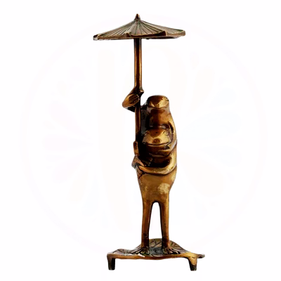 whimsical frog with umbrella sculpture