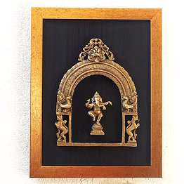brass prabhavali framed on black raw silk with dancing ganesha in antique gold frame. height 45 cm x width 35 cm pif-2615