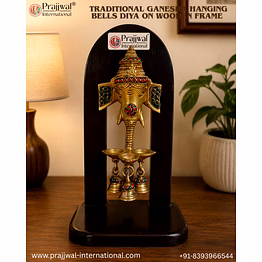 traditional ganesha hanging bells diya on wooden frame