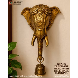 brass elephant head with bell wall hanging