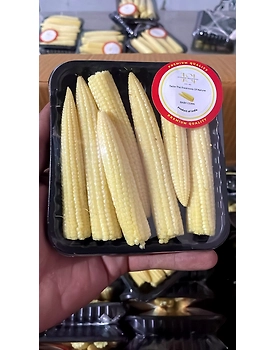 bunch of baby corn piled up