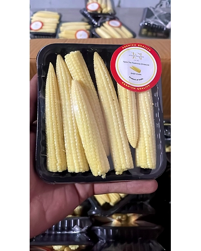 bunch of baby corn piled up