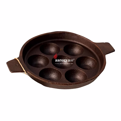aarogyam cast iron paniyaram pan 7 cavity , with ring at bottom for support, pre-seasoned 7.5 inch diameter (19cm), naturally non-stick, toxin-free, gas & induction compatible, weight- 1.5 kg