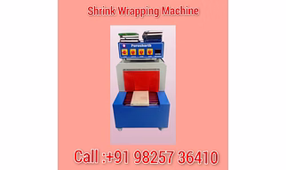 Book shrink wrapping machine