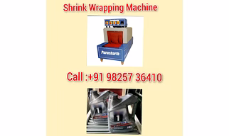 Engine oil bottle shrink wrapping machine