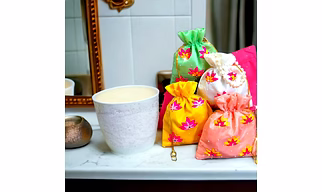 LOTUS POTLI / THREAD EMBROIDERED POTLI WITH HANDLE D POTLI WITH HANDLE