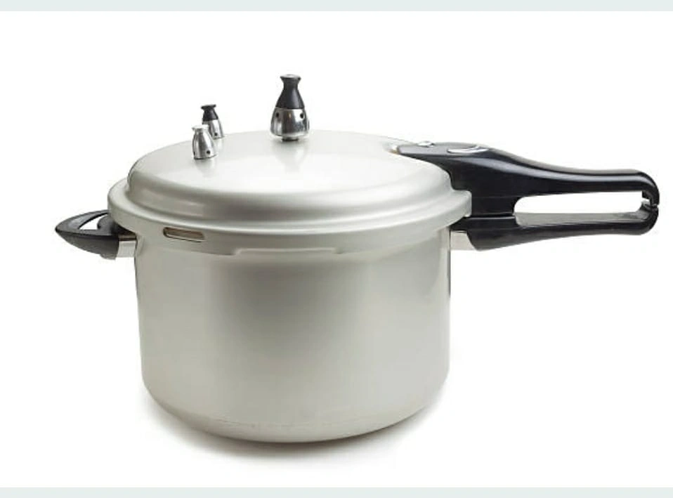 Pressure Cooker - Kitchen appliance used for cooking food quickly under high pressure.