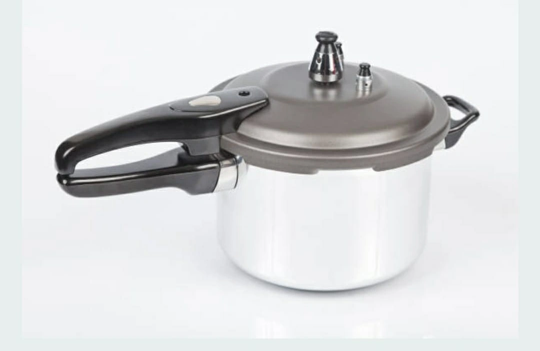 Pressure Cooker - Kitchen appliance used for cooking food quickly under high pressure.