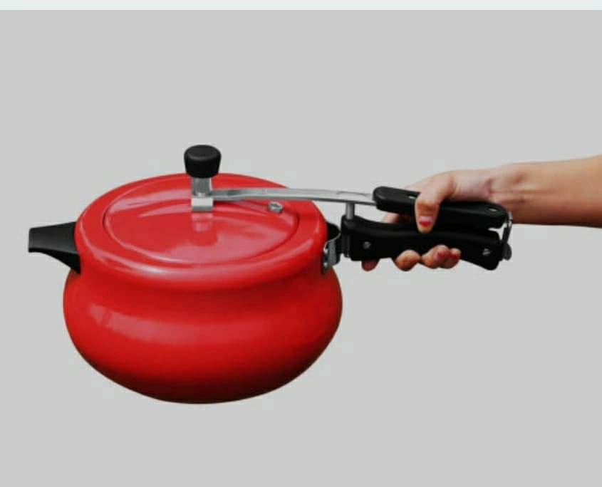 Pressure Cooker - Kitchen appliance used for cooking food quickly under high pressure.