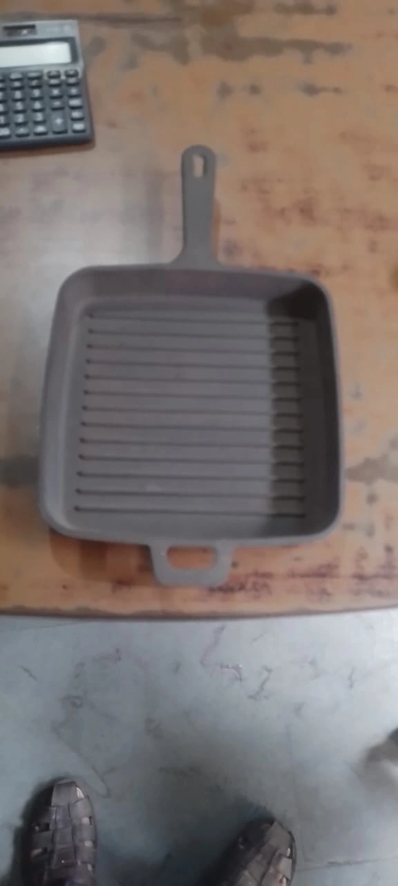 Barbecue Plate - Cooking surface used for grilling food outdoors.