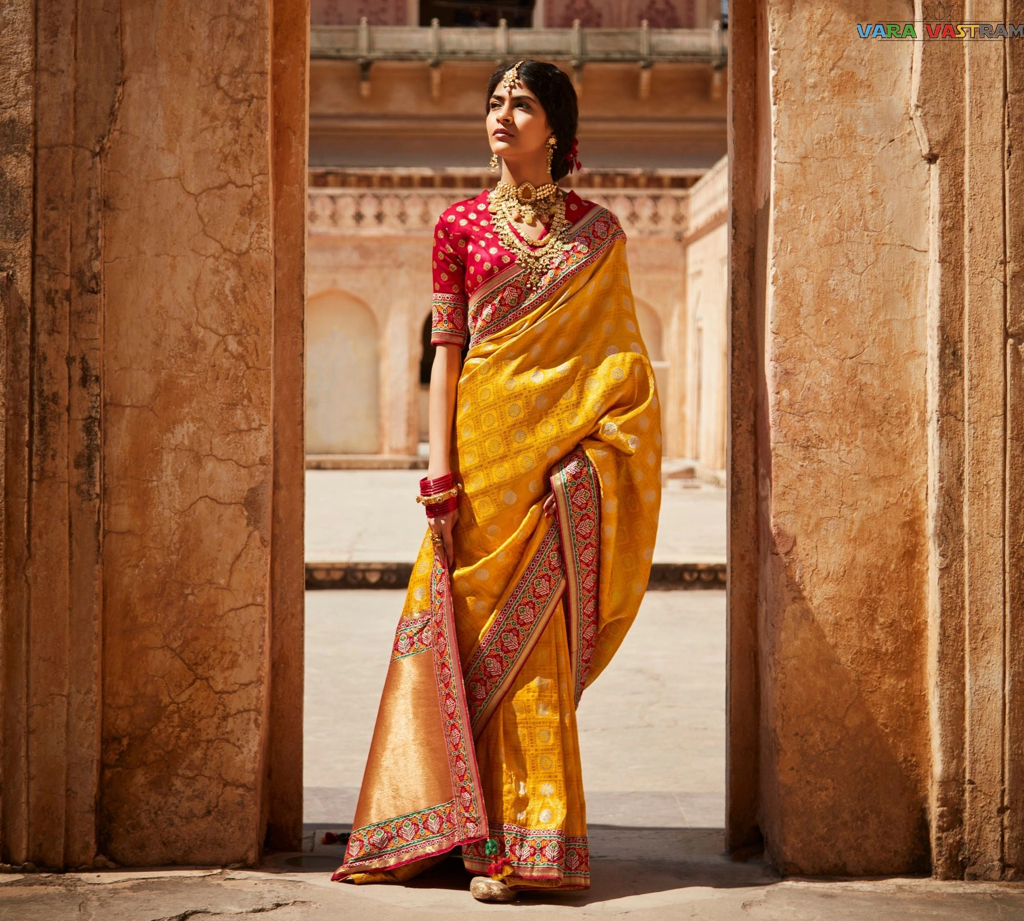 Sabyasachi-Inspired Tangerine Orange Silk Blend Saree &amp; Red Designer Blouse Featuring Gold Zari Accents, Elegant Indian Wedding And Festive Sari In The India-1