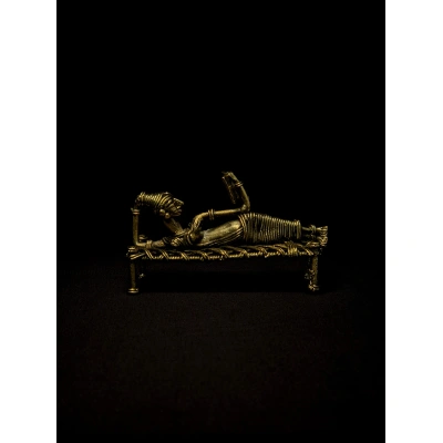 Dhokra - Tribal Lady Sleeping on Bed and Reading