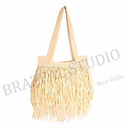 woven fringe tote bag - natural-toned woven tote bag with fringe body and long handles