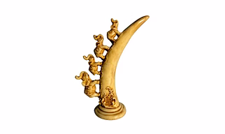 Cultered marble showpeice ( elephants carved on tusk ) Cultured marble elephant