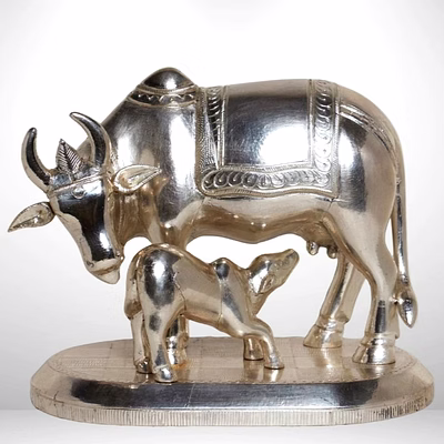 kalagya handcrafted kamdhenu cow and calf – wooden idol with silver cladding