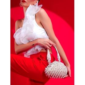 White Purse with handcrafted pearls detailing an ideal bridal bag