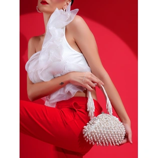 White Purse with handcrafted pearls detailing an ideal bridal bag