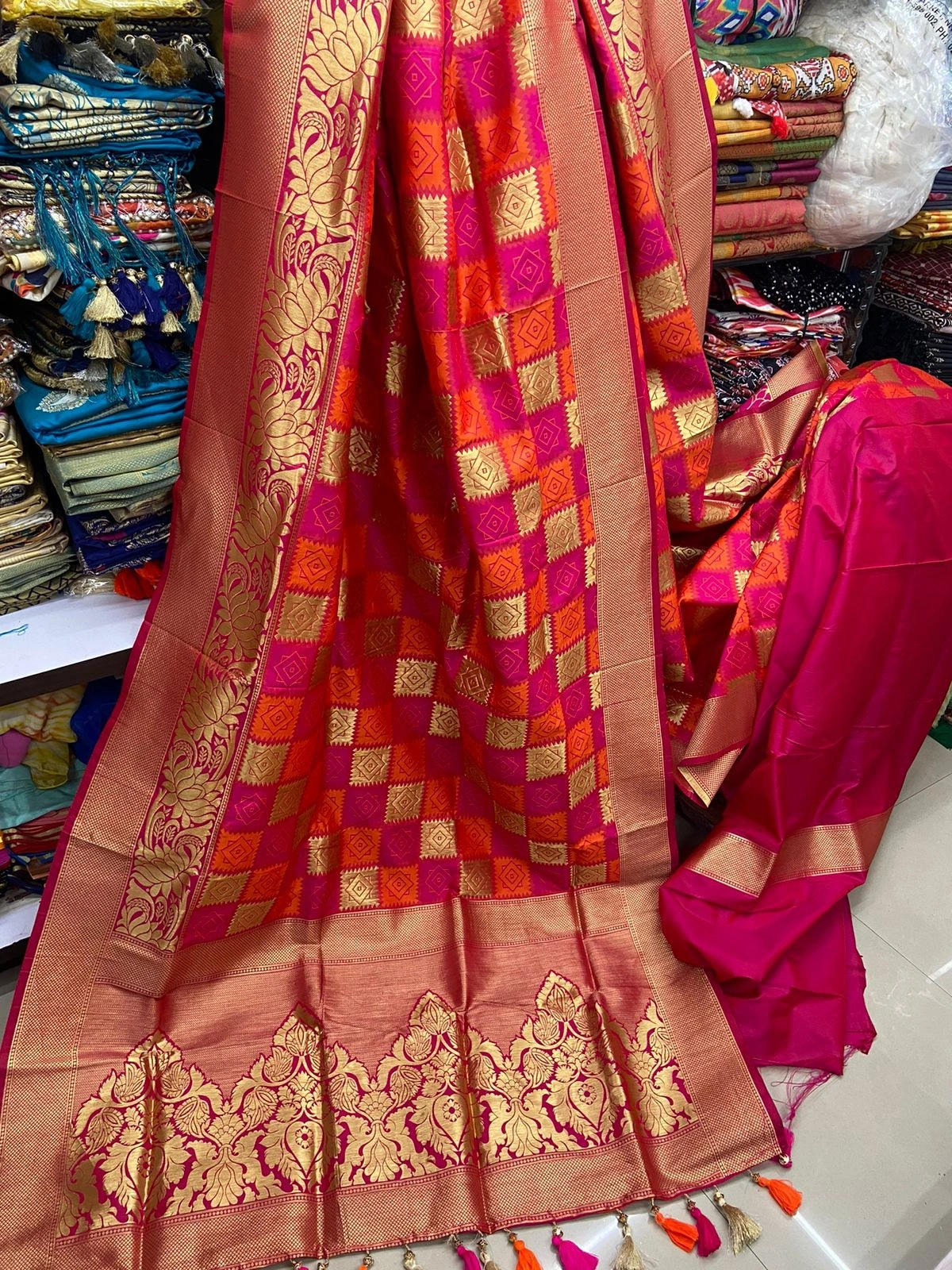 10 Words or Less: 
&quot;Exquisite Pure Silk Sarees with Intricate Weaving and Vibrant Colors&quot;-Red-2