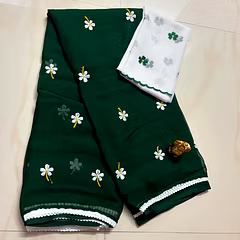 Richly Embroidered Georgette Saree with Tussels and Blouse