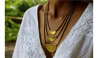 Artistically Crafted Bohemian Women's Layered Tribal Brass Half Moon Necklace
