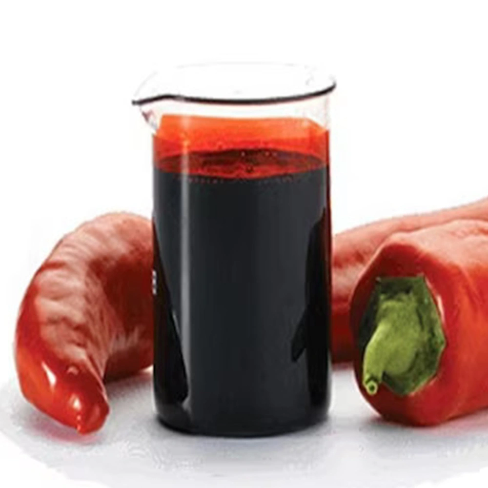 Image of a dropper bottle filled with capsicum oleoresin extract, indicating its intense flavor and