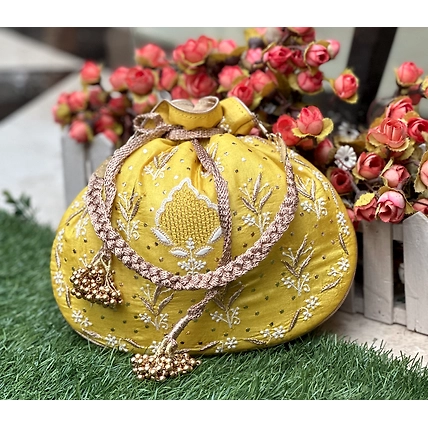 CLUTCHES,POTLI'S AND EVENING BAGS MADE ON RAW SILK-1