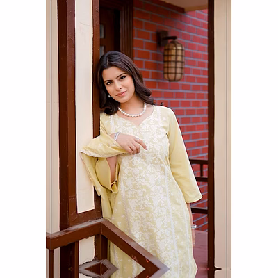 lemon yellow unstitched cotton suit with white thread embroidery