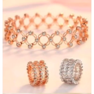 zig-zag style silver ring bracelet with rose gold plating & cz stones