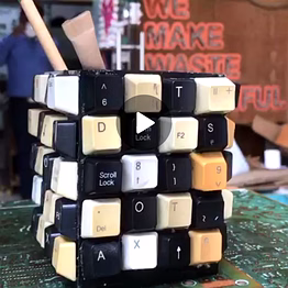 recycled pen stand | artwork made up of upcycled e-waste keyboard keys | body made up of mlp (multi layered plastic) sheet | eco friendly | green product | desk mount | stationery holder