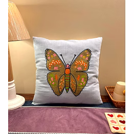 vibrant butterfly embroidered cushion cover